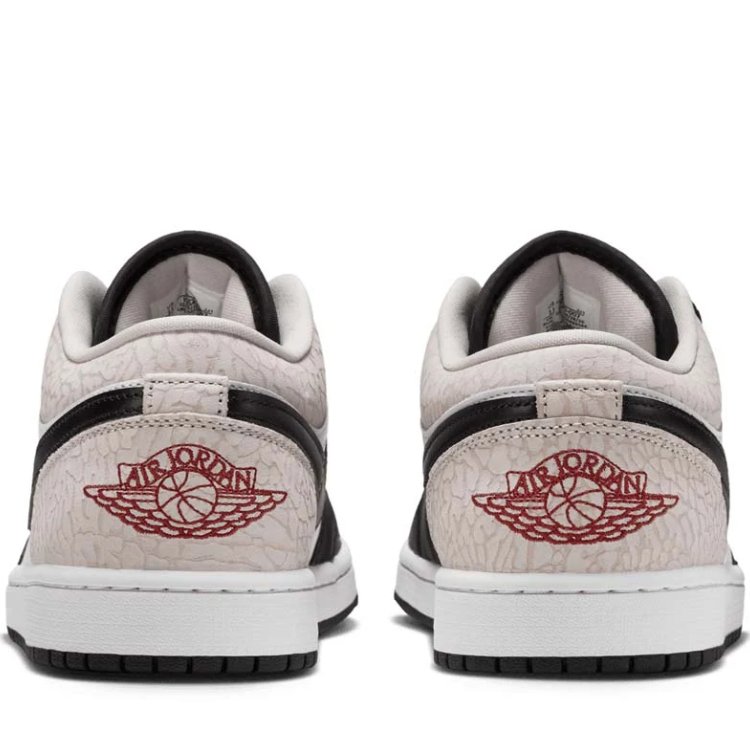 Nike Sneakers – Black & White Low-Top with Cracked-Look Cream Heel