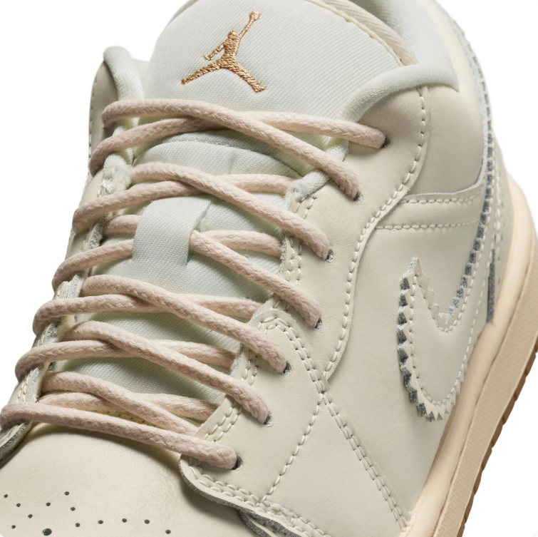 Nike Sneakers – Cream Low-Top with Brogue Details & Gold-Tone Accents